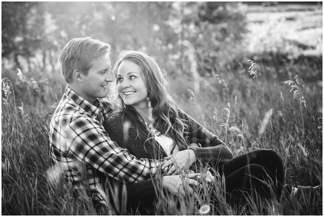 cute couple pose in tall grass - Alysha Sladek Photography